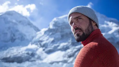 Disney+/PA Handout photo of Spencer Matthews from May 2022 at Everest Base Camp shooting the Disney+ film "Finding Michael".