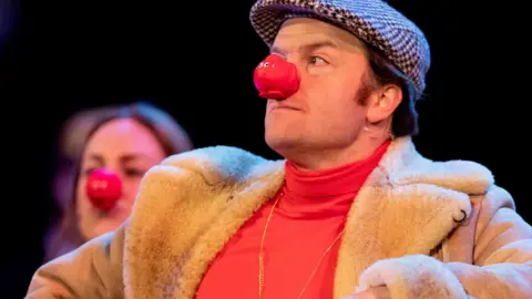 The stars of the Only Fools and Horses stage show wearing red noses in 2019