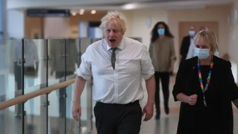 WPA pool/Getty Boris Johnson visiting a hospital in Hexham, Northumberland, on Monday