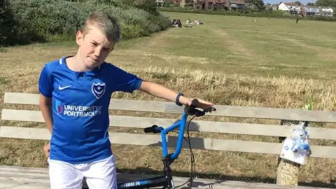 Day family Alfie, Daniel Day's son, at the bench