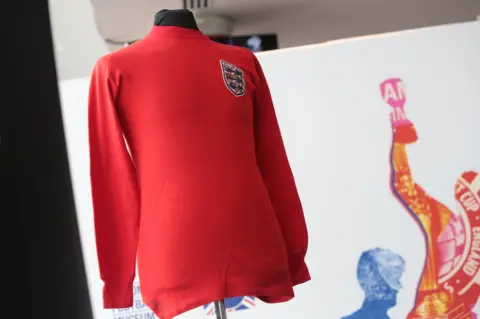 The FA/Getty Images Sir Geoff Hurst's 1966 World Cup final shirt on display in 2016 shortly before being auctioned