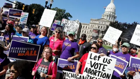 Getty Images Michigan women campaign for abortion rights ahead of ballot