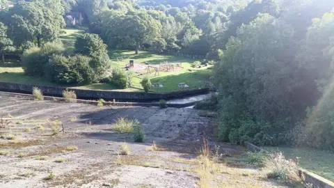 Supplied by resident Photo of the auxiliary spillway before it collapsed