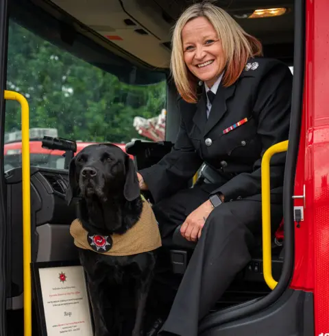Hertfordshire Fire and Rescue Service Reqs a fire dog with Nikki Harvey