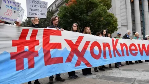 Getty Images Climate activists protest outside New York state supreme court - 22 October