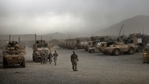 Getty Images A US soldier seen at an outpost in 2009 (File photo)