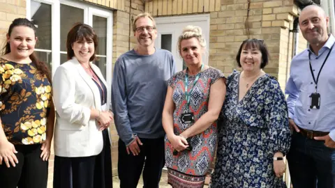 Lucy Taylor Photography/ Babergh and Mid Suffolk D Naome Kormanszki; Elizabeth Ling, the Stone Foundation training lead; Richard Winch, Mid Suffolk cabinet member for housing; Stephanie Lloyd, Central Suffolk Lettings team manager; Anne Bennett, chief executive officer at The Stone Foundation; and Mark Avery, CSL tenancy management officer