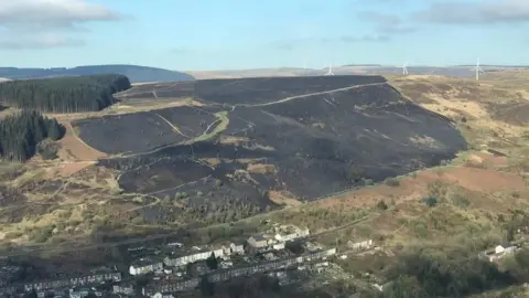 SWFRS The landscape above Ferndale is charred after a grass fire