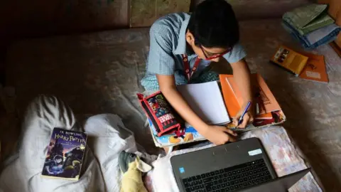 Getty Images Student takes online classes in India