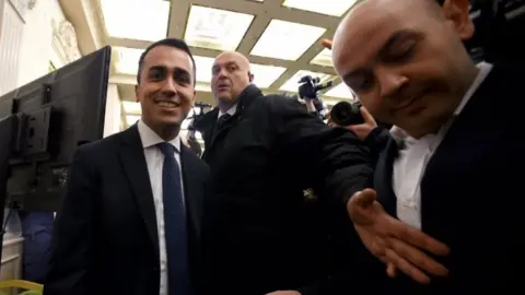 AFP/Getty Images Five Star leader leader Luigi Di Maio (left) in Rome. Photo: 5 March