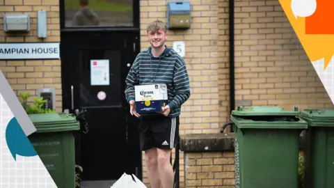 Getty Images Student from Glasgow University at their accommodation at Murano Street student village on September 28, 2020