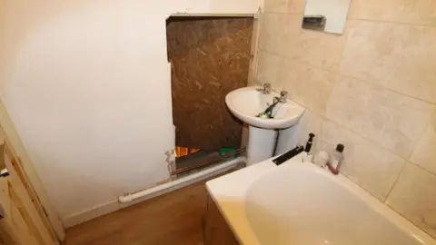 Nottinghamshire Police Secret door in bathroom