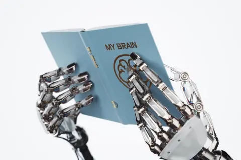 Getty Images Robot reading