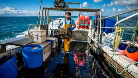 PA Media Fishing boat off coast of Jersey