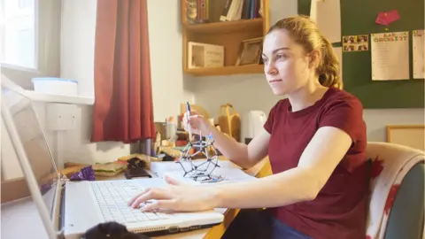 MartinPrescott - Getty Student in their dorm