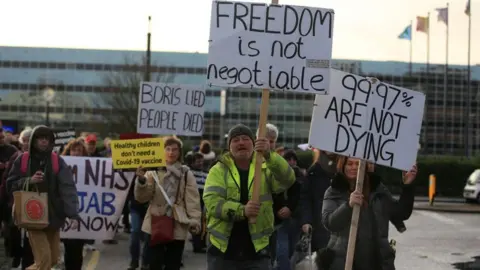 Covid: Anti-vax protesters disrupt Milton Keynes NHS test centre