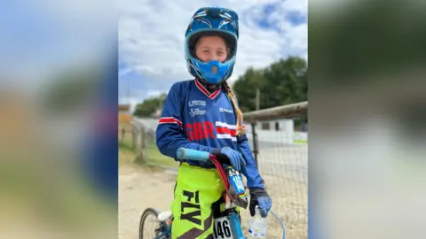 Eaton Family Amelie Eaton on her bike
