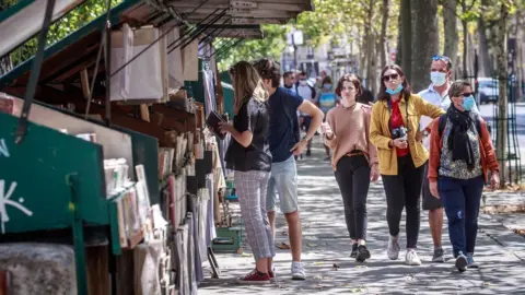 EPA People walking on the street in central Paris