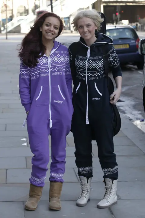 Getty Images Jade Thirlwall and Perrie Edwards pose outside a hotel in 2011