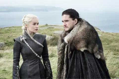 HBO Emilia Clarke as Daenerys Targaryen and Kit Harington as Jon Snow