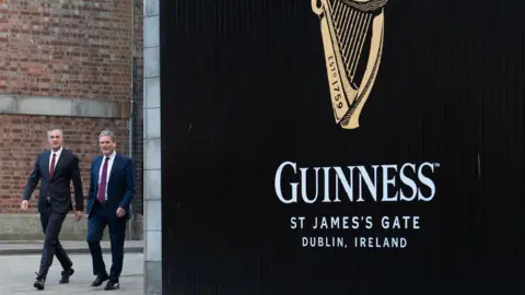 Stefan Rousseau/PA Wire Sir Keir Starmer and Shadow Northern Ireland Secretary Peter Kyle at the Guinness brewery in Dublin