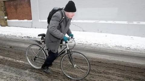 PA Media Boris Johnson cycling