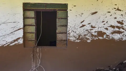 Getty Images House struck by the mud in Córrego do Feijão near the town of Brumadinho