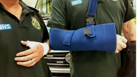 West Midlands Ambulance Service Picture of injured staff after attack
