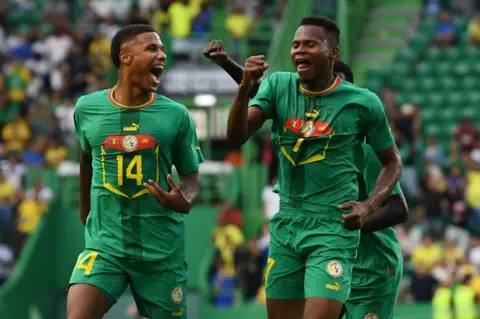 Zed Jameson/Getty Images Habib Diallo of Senegal celebrates on the pitch in Lisbon, Portugal, on 20 June.