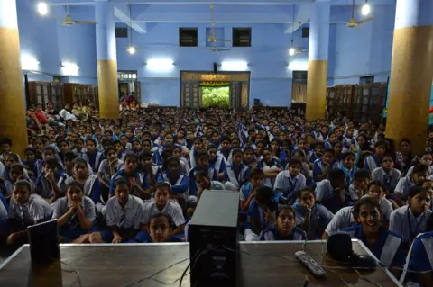 AFP/Getty Images Indian schoolchildren at a government school in Delhi