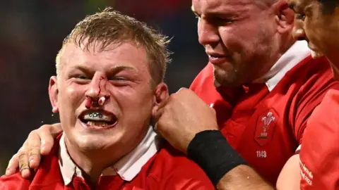 Getty Images Jac Morgan celebrates after scoring a try