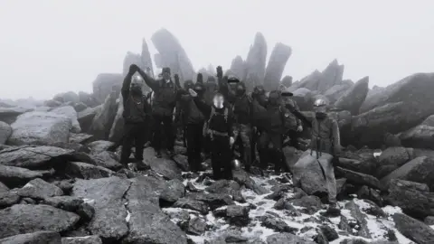 Hope Not Hate Members of White Stag Athletic Club perform a Nazi salute during a hike