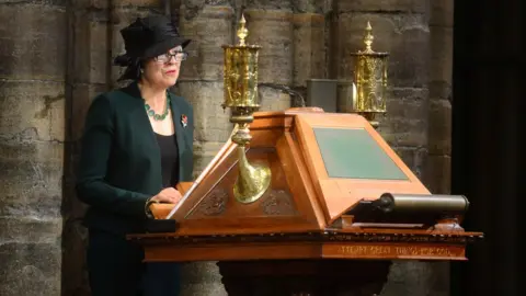 Reuters Theresa May read a passage from the Book of Isaiah