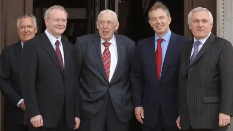 PA Peter Hain, Martin McGuinness, Ian Paisley, Tony Blair and Bertie Ahern on the day devolution was restored in 2007