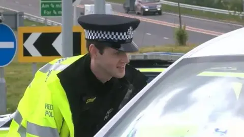 BBC police officer speaking to driver