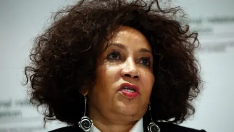 Getty Images Minister of Human Settlements, Water & Sanitation, Lindiwe Sisulu, has urged the police to act against people targeting foreigners