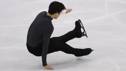 Reuters Nathan Chen tumbles during his performance