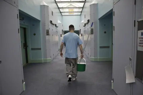 Getty Images Prisoner with cleaning duties