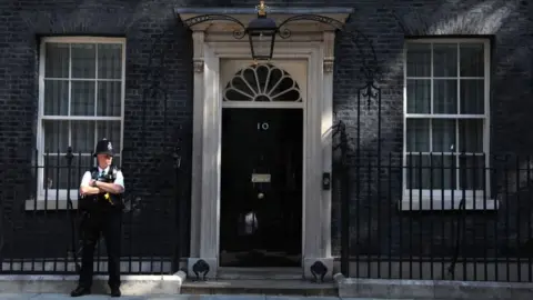 Getty Images A policeman standing outside 10 Downing Street