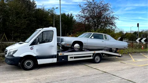 National Highways The 3.5-tonnes transporter carrying a vintage American car