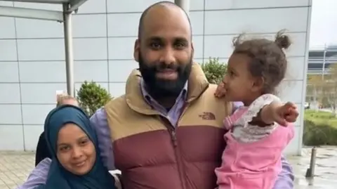 Mohammed Bardo is reunited with his wife Somaya and daughter, who escaped Sudan