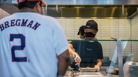 Getty Images Worker at Chipotle