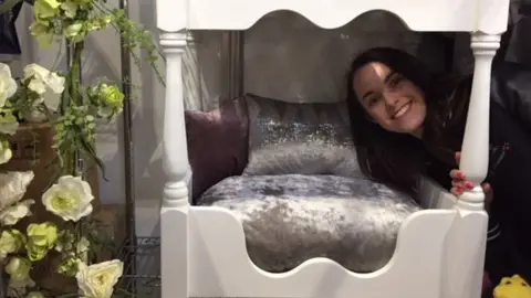 Courtney Gilbert with her four-poster dog bed