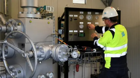 Reuters Worker at gas storage facility, Kraiburg am Inn, Germany, June 2022