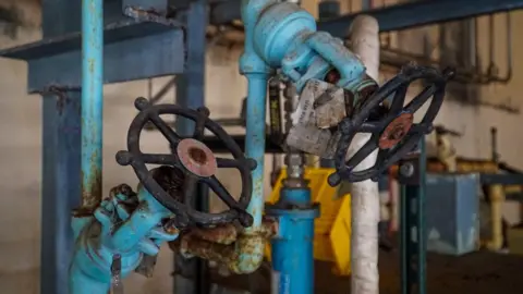 BBC/Virma Simonette Rusty looking pipes inside the Bataan plant