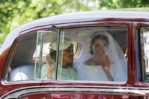 Getty Images Meghan Markle with her mother Doria Ragland drive down the Long Walk as they arrive at Windsor Castle