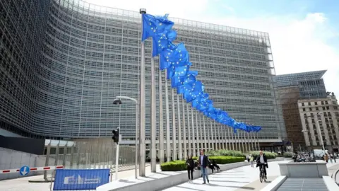 Getty Images European Union flags wave in front of the Berlaymont Building (European Commission's headquarters) in Brussels