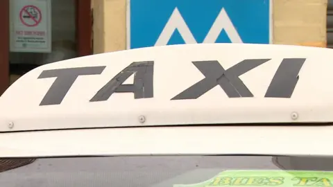 BBC Taxi sign