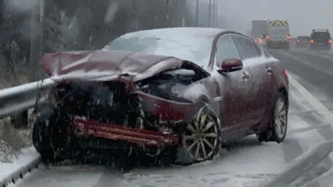 West Yorkshire Police Road Policing Unit Smashed car on M62