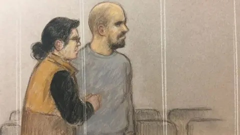 Julia Quenzler Court sketch of Harem Ahmed Abwbaker (with his interpreter next to him in court) on 30 November